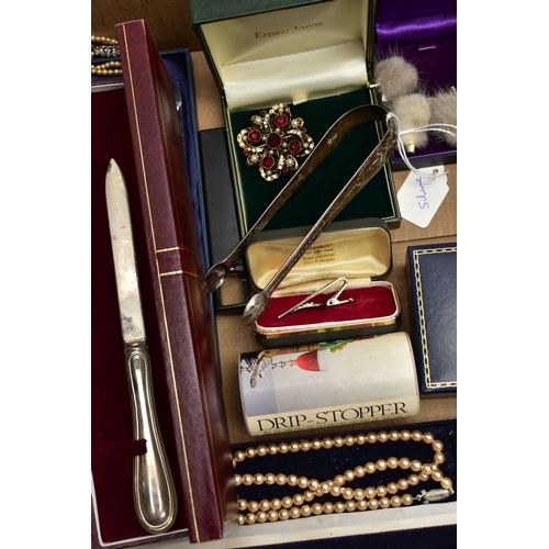 124 - A PAIR OF SILVER SUGAR TONGS AND A BOX OF ASSORTED WHITE METAL WARE, a pair of Georgian bright cut s... 