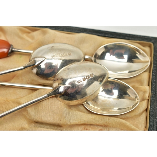 132 - A CASED SET OF SIX SILVER COFFEE SPOONS, each polished spoon is set to the terminal with a semi-prec... 