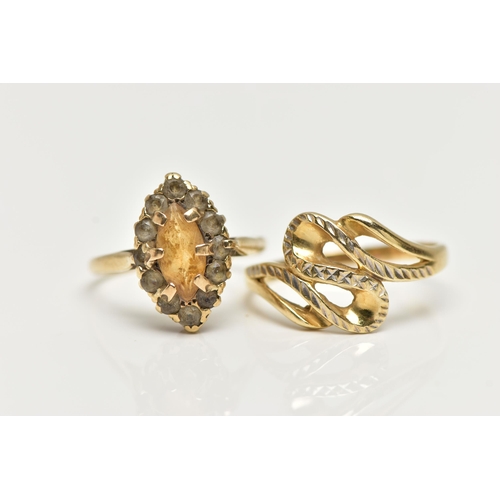 26 - TWO RINGS, the first a 9ct gold cluster ring set with a marquise cut citrine in a surround of colour... 