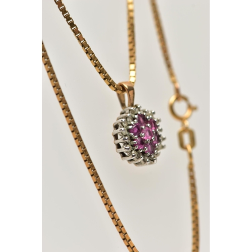 31 - A 9CT GOLD RUBY AND DIAMOND PENDANT, seven circular cut rubies, prong set with a surround of round b... 