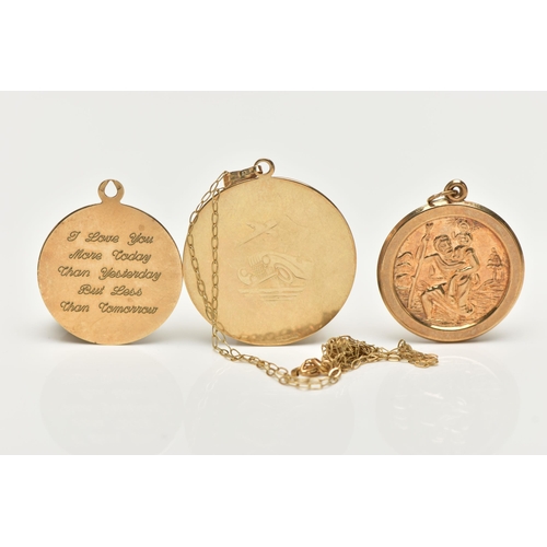 32 - TWO 9CT GOLD AND ONE YELLOW METAL ST. CHRISTOPHER PENDANTS, the first fitted with a bail and suspend... 