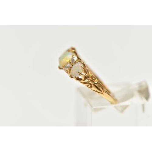 38 - A EARLY 20TH CENTURY 18CT GOLD OPAL AND DIAMOND RING, three cabochon opals, interspaced with four ol... 