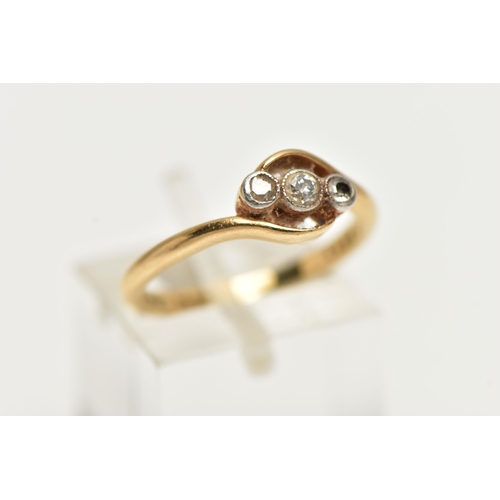 39 - A DIAMOND THREE STONE RING, three single cut diamonds, bezel set with milgrain detail, yellow metal ... 