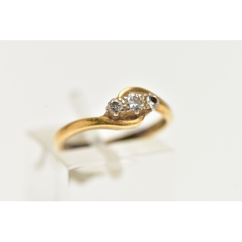 43 - A DIAMOND THREE STONE RING, three single cut diamonds, prong set, yellow gold bypass mount, hallmark... 