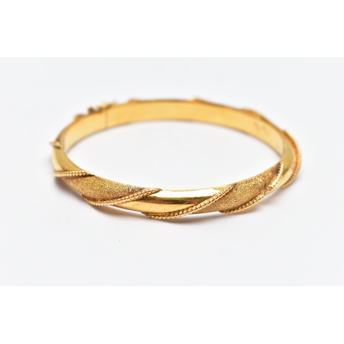 48 - A MODERN ASIAN HINGED BANGLE, approximate inner diameter 61mm, stamped 916, tested and assessed as 2... 