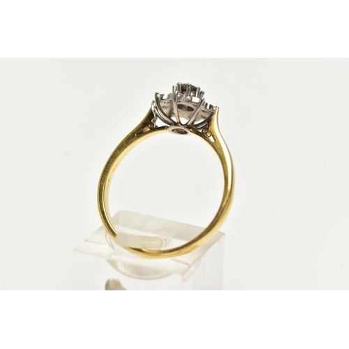 51 - A MODERN DIAMOND CLUSTER RING, set with a principal round brilliant cut diamond, surrounded by eight... 