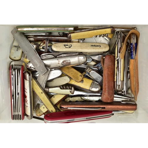 99 - A PLASTIC BOX OF ASSORTED FRUIT AND POCKET KNIVES, used conditions, stainless steel, some with plast... 