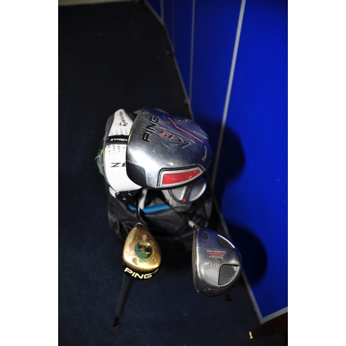 1054 - GOLF EQUIPMENT comprising a Ram golf bag containing seven golf clubs, Odyssey white hot putter, Zebr... 