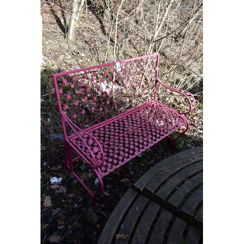 901 - A PINK PAINTED WROUGHT IRON GARDEN BENCH, with floral decoration, length 114cm (condition:-slightly ... 