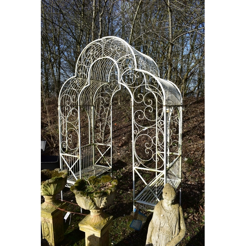 904 - AN ARCHICTURAL WROUGHT IRON GARDEN ROSE ARBOUR, with a seat at each end, width 170cm x depth 93cm x ... 