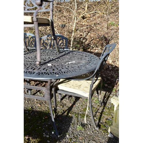 905 - A HARTMAN CAST ALUMIUNIUM OVAL GARDEN TABLE, length 221cm x depth 107cm x height 74cm, and six armch... 