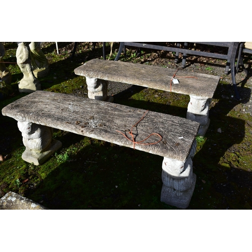 909 - A PAIR OF WEATHERED COMPOSITE TREE EFFECT BENCHES, on twin squirrel shaped bases, length 108cm (cond... 