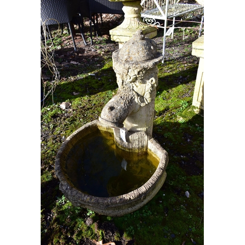 912 - A COMPOSITE WEATHERED WATER FEATURE, of a water pump and bucket, max height 67cm