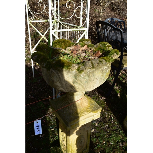 913 - A PAIR OF WEATHERED ACANTHUS LEAF PLANTERS, on a separate plinth, diameter 48cm x height 89cm x heig... 