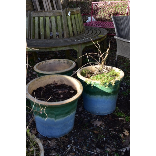 916 - THREE SIMILAR GREEN AND PALE BLUE GLAZED PLANTERS, diameter 46cm x height 39cm (condition:-in weathe... 