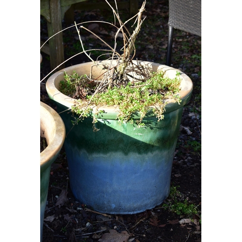 916 - THREE SIMILAR GREEN AND PALE BLUE GLAZED PLANTERS, diameter 46cm x height 39cm (condition:-in weathe... 