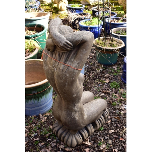 917 - A WEATHERED COMPOSITE GARDEN FIGURE OF A NUDE LADY KNEELING, height 96cm