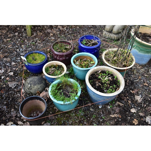 919 - NINE VARIOUS GLAZED CIRCULAR PLANT POTS, of various sizes and colours, largest plant pot diameter, 3... 