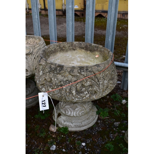 927 - A SET OF THREE WEATHERED COMPOSITE PLANTERS, on separate bases, diameter 45cm x height 45cm (conditi... 