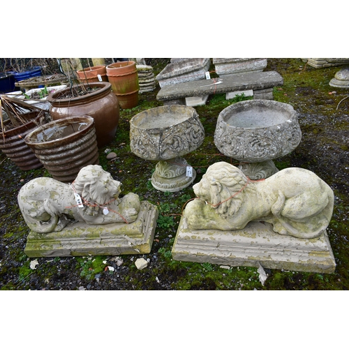 932 - A PAIR OF WEATHERED COMPOSITE LION, length 66cm x depth 29cm x height 42cm (condition:- overpainted ... 