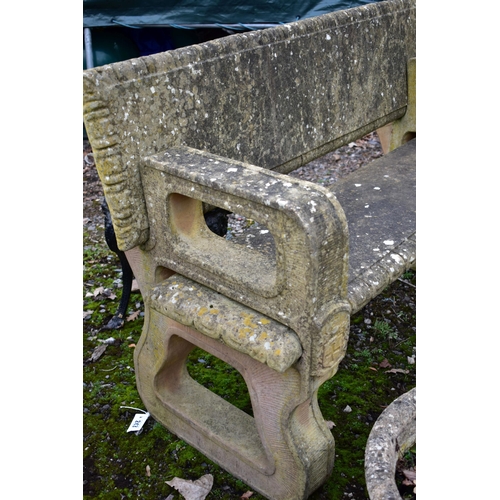 938 - A WEATHERED COMPOSITE GARDEN BENCH, gothic taste, that dismantles into four pieces, length 129cm x d... 