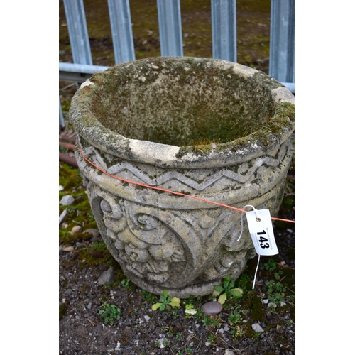 943 - A PAIR OF WEATHERED COMPOSITE CIRCULAR PLANTERS, diameter 41cm x height 39cm (condition:-no apparent... 