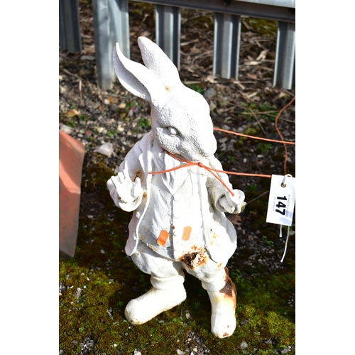 947 - TWO MATCHING PAINTED CAST IRON PETER RABBIT GARDEN FIGURES, height 45cm