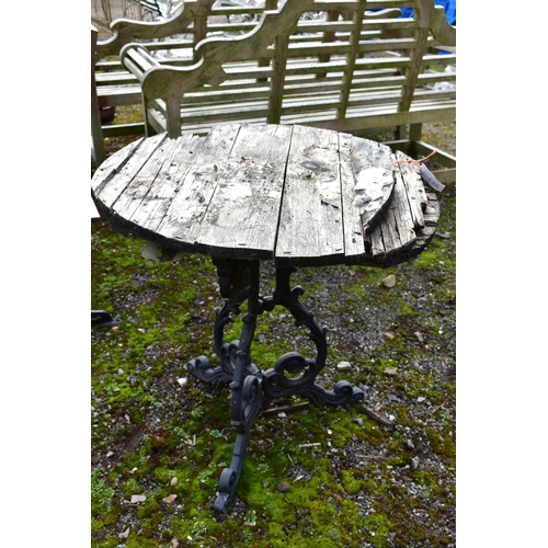 948 - A CAST ALUMINIUM GARDEN TABLE, diameter 70cm x height 71cm (condition:-wooden top distressed and ide... 