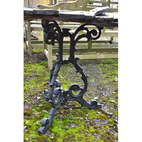 948 - A CAST ALUMINIUM GARDEN TABLE, diameter 70cm x height 71cm (condition:-wooden top distressed and ide... 