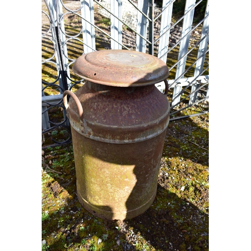 957 - A RUSTED ALUMINIUM MILK CHURN