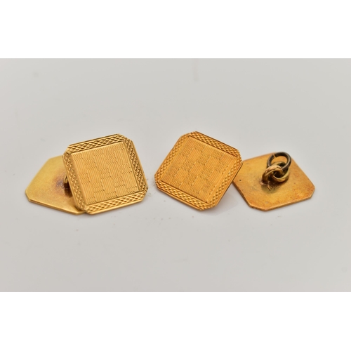 10 - A PAIR OF YELLOW METAL CUFFLINKS, square shape with  cut off corners, engine turned pattern, fitted ... 