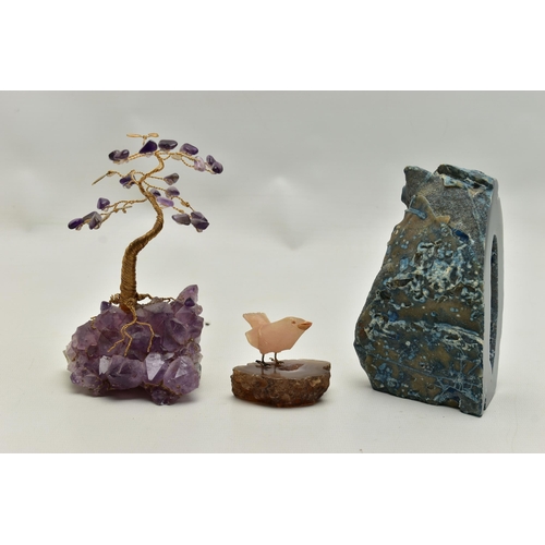 104 - THREE MINERAL SPECIMEMS, the first an amethyst geode, fashioned with a yellow metal wire tree suspen... 