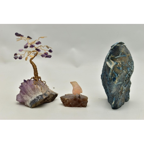 104 - THREE MINERAL SPECIMEMS, the first an amethyst geode, fashioned with a yellow metal wire tree suspen... 