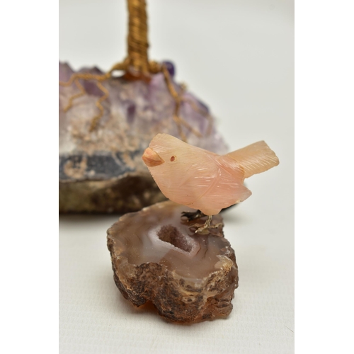 104 - THREE MINERAL SPECIMEMS, the first an amethyst geode, fashioned with a yellow metal wire tree suspen... 