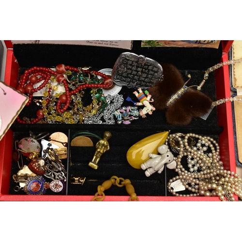 108 - AN ASSORTMENT OF JEWELLERY AND BOXES, to include a heart locket, stamped 9ct back and front, a white... 