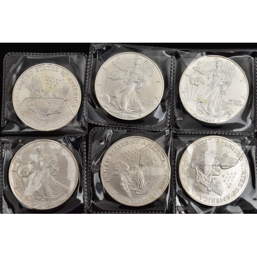 124 - A QUANTITY OF SILVER EAGLE COINS USA, nineteen in total 1991 (2) 1993 (3) 1997,  1999 (3) 2000 (2) 2... 