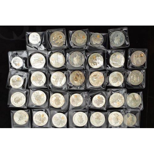 128 - A QUANTITY OF 1997 QUEEN ELIZABETH/PHILIP STERLING SILVER CROWN SIZE COINS, with highlighted Shield ... 