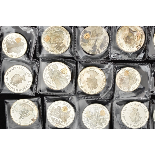 128 - A QUANTITY OF 1997 QUEEN ELIZABETH/PHILIP STERLING SILVER CROWN SIZE COINS, with highlighted Shield ... 