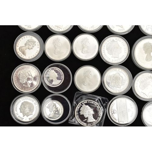 129 - A PLASTIC BOX CONTAINING SILVER AND SILVER PROOF COINS, to include 2x Britainia 2001, 2005 Silver co... 