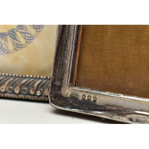 152 - THREE EARLY 20TH CENTURY SILVER MOUNTED EASEL BACK PHOTOGRAPH FRAMES, of rectangular form, all with ... 