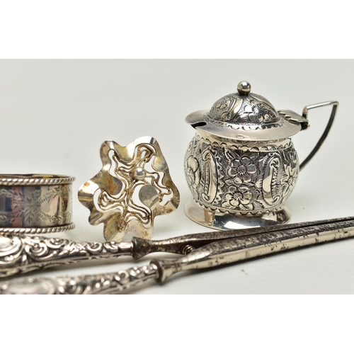 155 - FOUR SMALL PIECES OF SILVER, comprising a late Victorian mustard with floral repoussé decoration and... 