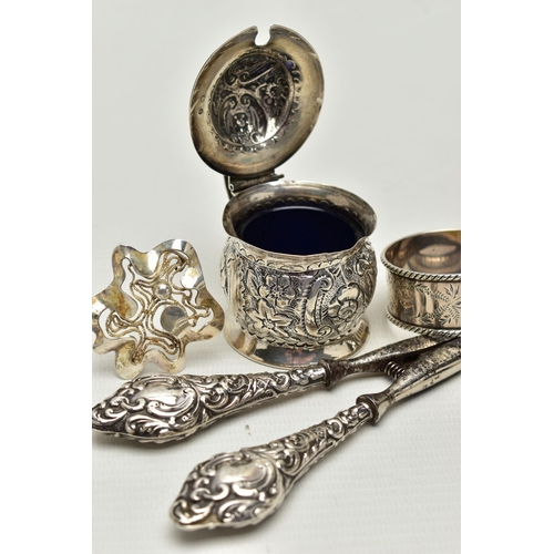 155 - FOUR SMALL PIECES OF SILVER, comprising a late Victorian mustard with floral repoussé decoration and... 