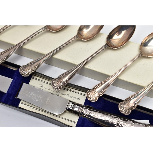 156 - A BOXED ELIZABETH II SILVER HANDLED CAKE KNIFE AND A SET OF SIX GEORGE V SILVER COFFEE SPOONS, the k... 