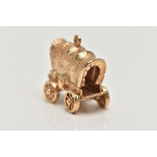 17 - A 9CT GOLD CHARM, yellow gold charm of a wagon with moving wheels, hallmarked 9ct London, approximat... 