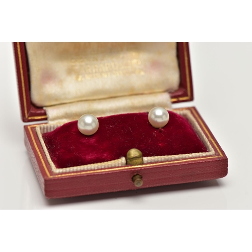 2 - A PAIR OF CULTURED PEARL STUD EARRINGS, each earring set with a cultured pearl, measuring approximat... 