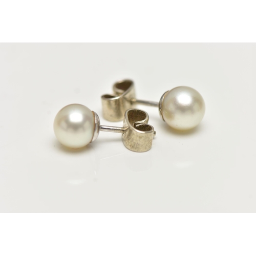 2 - A PAIR OF CULTURED PEARL STUD EARRINGS, each earring set with a cultured pearl, measuring approximat... 