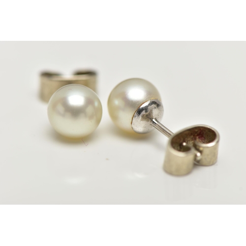 2 - A PAIR OF CULTURED PEARL STUD EARRINGS, each earring set with a cultured pearl, measuring approximat... 