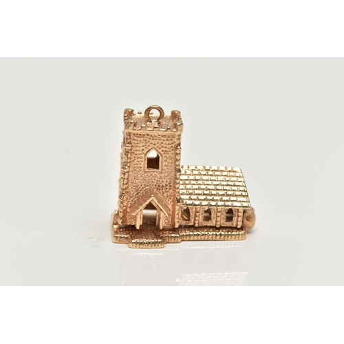 20 - A 9CT GOLD CHARM, yellow gold charm of a church, hinged base, opens to reveal a wedding, hallmarked ... 