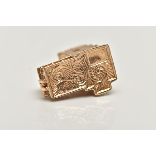 20 - A 9CT GOLD CHARM, yellow gold charm of a church, hinged base, opens to reveal a wedding, hallmarked ... 