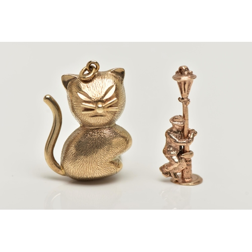 22 - TWO 9CT GOLD CHARMS, the first a yellow gold cat charm, hallmarked 9ct Birmingham import, approximat... 